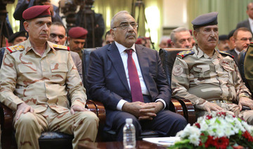 Iraq parliament approves ministers but deadlock over security posts