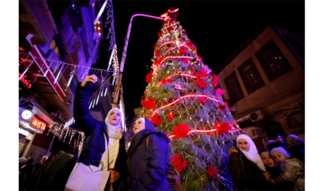 Damascus lights up its biggest Christmas tree