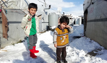 ’I need a blanket’: Lebanon winter storm batters refugee tents