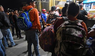 Hundreds of Hondurans set off toward US in new caravan