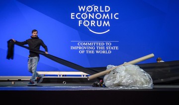 Facing populist assault, global elites regroup in Davos