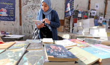 Cairo book fair gleaming new site opens far from historic market