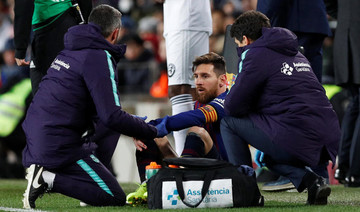 Lionel Messi has injury scare after scoring two goals in Barca draw