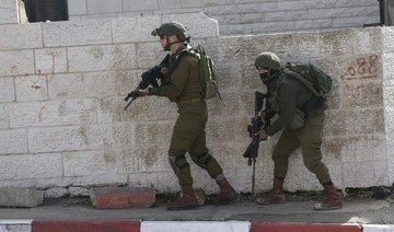 Israeli troops kill Palestinian in West Bank, say he threw bomb