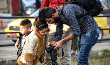 Photographers in Iraq’s Mosul snap dark days, bright futures