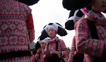 Girls sport their ancestors’ hair for Lunar New year in China