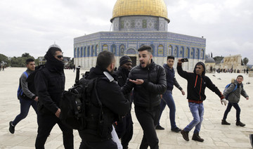 Israeli police arrest 19 Palestinians at Jerusalem holy site