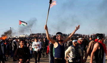 Palestinians protest in Gaza and Jerusalem, 1 killed