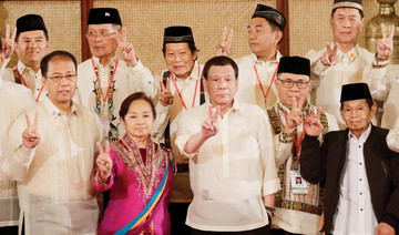 Filipino rebel chiefs become officials under peace deal