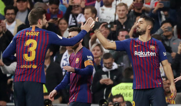 Suarez double sends Barcelona past Real Madrid and into Copa del Rey final