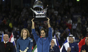‘Fortunate’ Roger Federer shows no signs of slowing after 100th title in Dubai