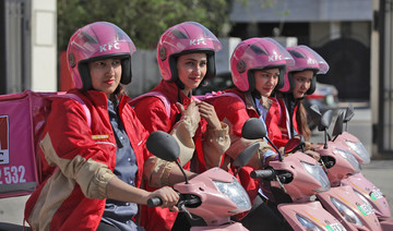 Engines revving, Pakistan’s first all-women food delivery workers ride with pride