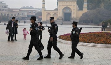 China says nearly 13,000 'terrorists' arrested in Xinjiang