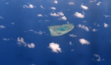 Philippines protests ‘swarming’ of Chinese boats near island