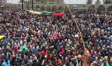Tear gas, gun fire outside army HQ as Sudan protests press on