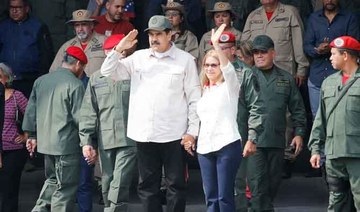 Venezuela’s Maduro orders militia expansion as Guaido tours blackout-ravaged state