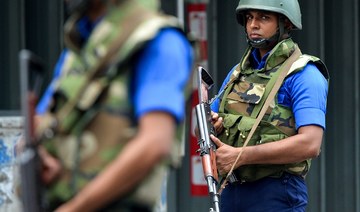 Militants set off bombs during Sri Lanka raid, killing 15