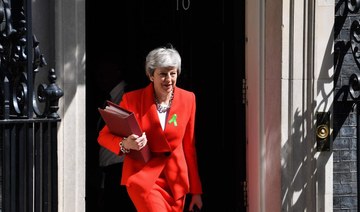 British PM May deeply concerned by jailing of woman in Iran
