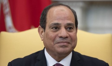 Egypt’s president pardons 560, including prominent columnist