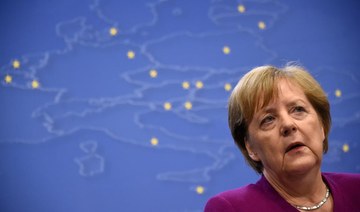 Merkel team talks climate as voters turn up heat
