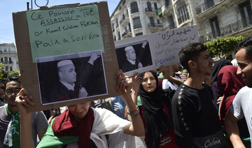 Funeral of  Algerian activist draws thousands after prison death