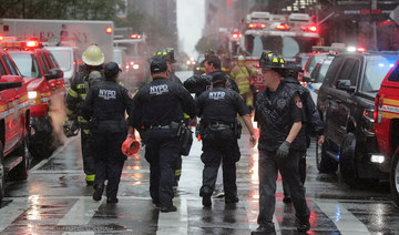 One dead after helicopter crash lands on top of Manhattan building