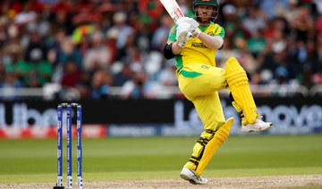 Warner ton against Bangladesh sends Australia top of World Cup table