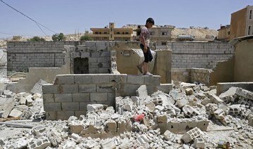 Lebanon forces Syrian refugees to tear down walls