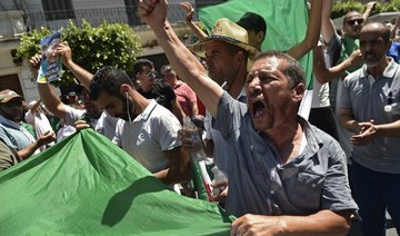 Thousands protest in Algeria capital, break police cordon