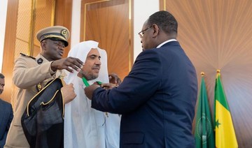 Senegal president honors Muslim World League chief for efforts to spread moderation