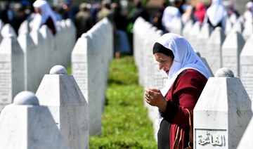 Bosnian Muslims mark 1995 massacre of thousands with burials