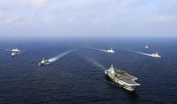 After Taiwan buys arms, China holds military drills on southeast coast