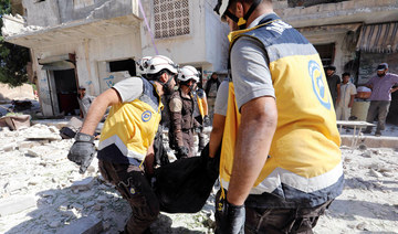 Workers recover over 300 bodies from Syrian mass grave