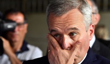 French minister resigns in luxury dinners scandal