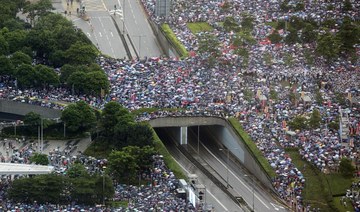 Hong Kong protesters continue past march’s end point
