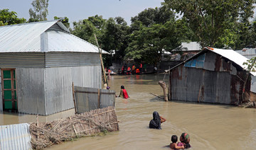Bangladesh tries new way to aid flood-hit families: cash up front