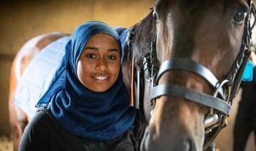‘Fairytale’ win for Khadijah Mellah, first British jockey to race in hijab