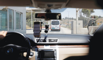 Palestinian app helps drivers  avoid Israeli checkpoint bottlenecks