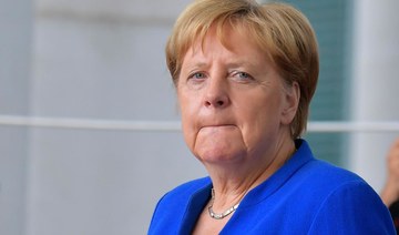 Merkel warns of Brexit economic pain before Johnson visit