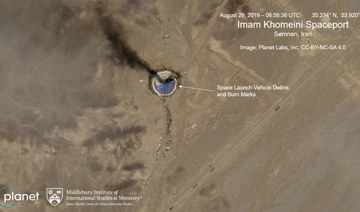 Satellite photos shows burning rocket at Iranian space center