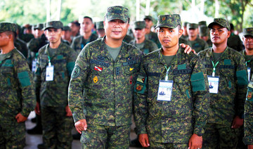219 former Philippine Muslim rebel fighters turn peacekeepers