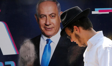 Embattled Israeli PM fights for survival in do-over election