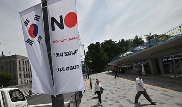 South Korea downgrades Japan trade status as dispute deepens