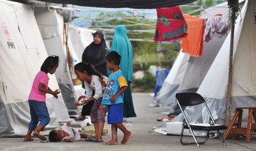 Tens of thousands homeless a year after Indonesia quake: Red Cross