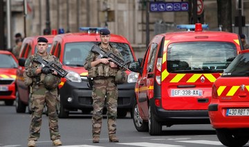 Motive sought for deadly stabbing spree at Paris police HQ