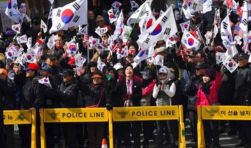 Pro-government supporters rally in Seoul over minister