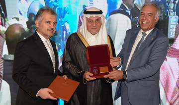 Saudi Arabia’s Prince Turki Al-Faisal receives one of Afghanistan’s highest honors