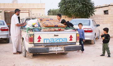 Kurd families flee to Iraq as armies advance