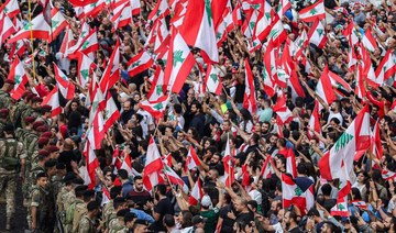 London’s Lebanese sympathize with protests, struggle to send money