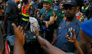 South Africans scream, sing and dance as Springboks return